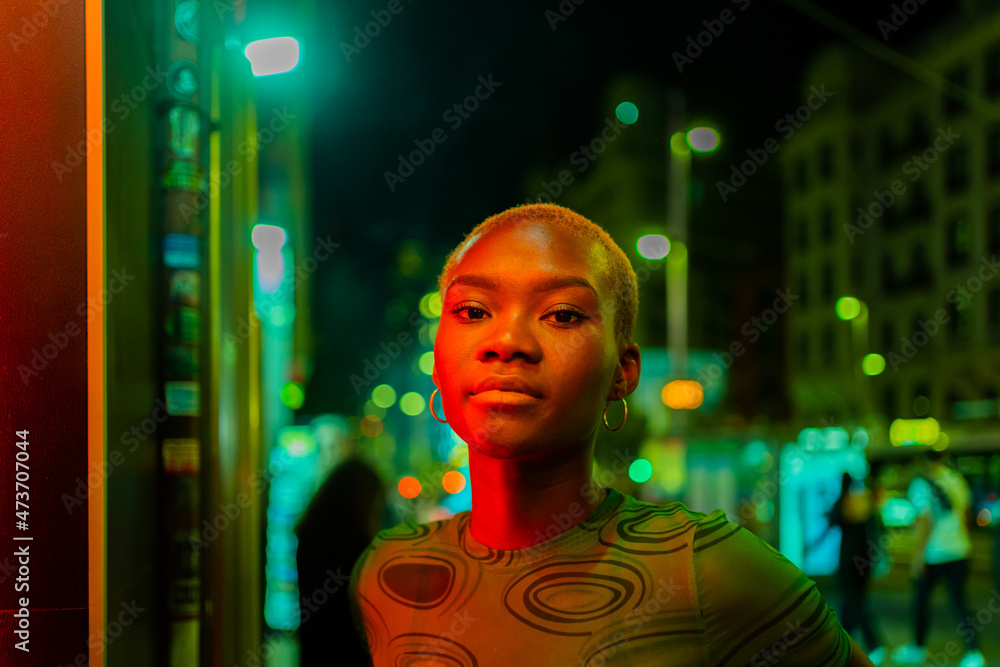 Portrait Of A Shorthaired Woman On The Street At Night. Portrait Of A Shorthaired Woman On The Street At Night.
