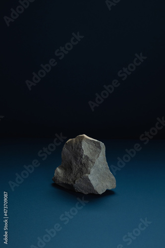 Monolith Rock/stone on dark background photo