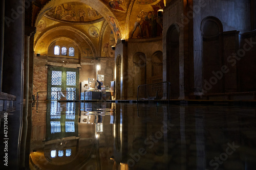 Flooding tide submerges Saint Mark's cathedral, Venice photo