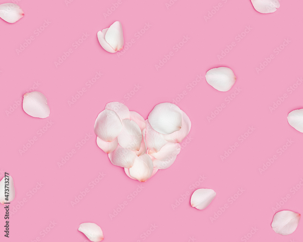 Shape Heart made of rose flower petals and white petals around on pink background. Valentines Day, Mothers Day holiday concept. Flat lay flowers composition, top view