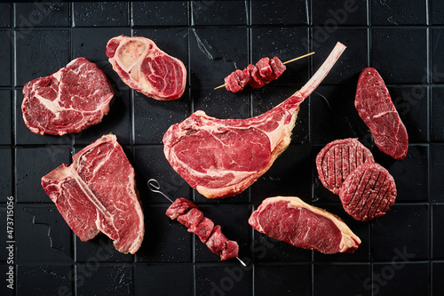 Canvas Print Set of different raw steaks cutlets and shashlik