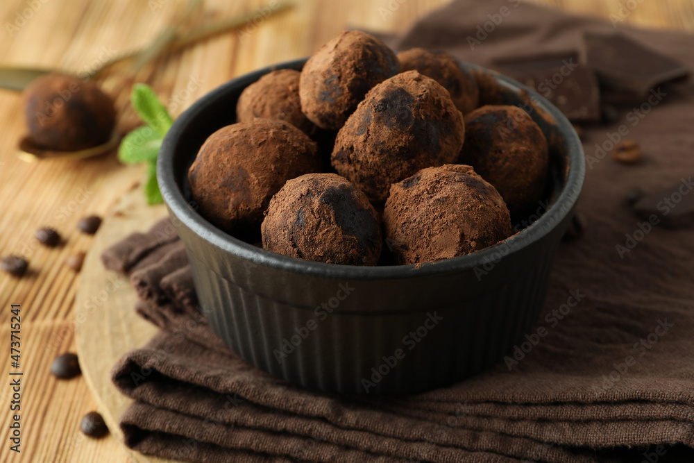 Concept of sweets with truffles on wooden background Concept of sweets with truffles on wooden background