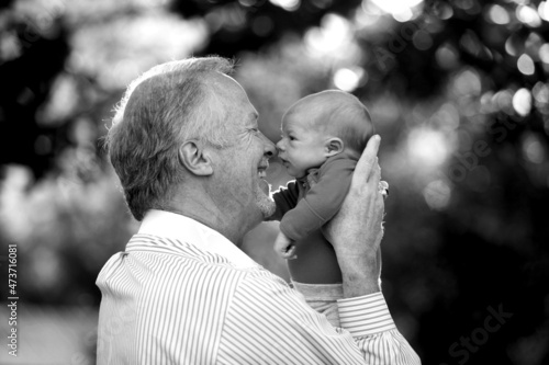 Grandpa Holding Newborn