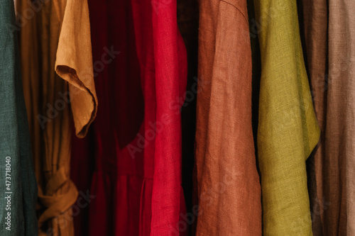 Rack with linen clothes photo