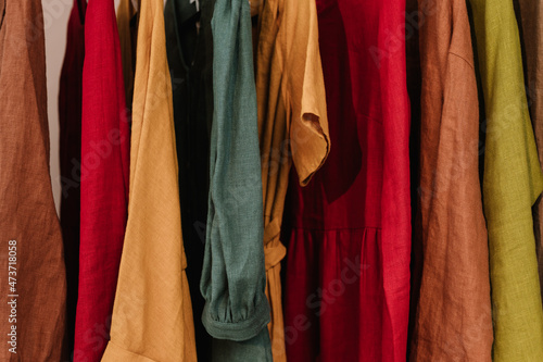 Rack with linen clothes photo