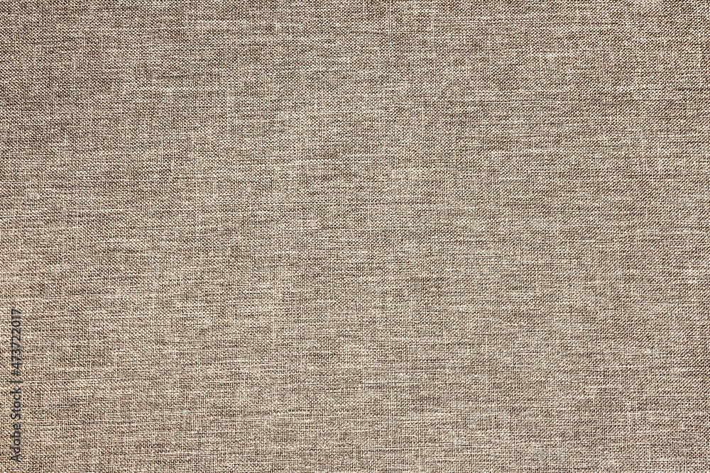 Natural brown linen fabric background. Fiber structure texture. Vintage canvas pattern. Natural brown linen fabric background. Fiber structure texture. Vintage canvas pattern.