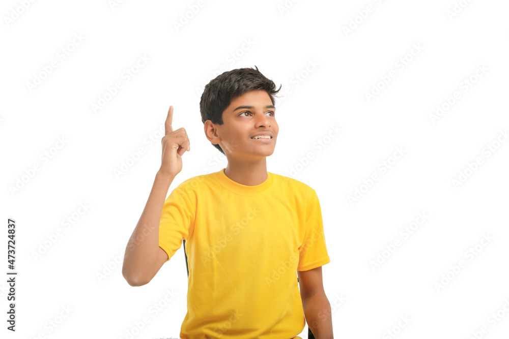 Indian child giving expression on white background. Indian child giving expression on white background.