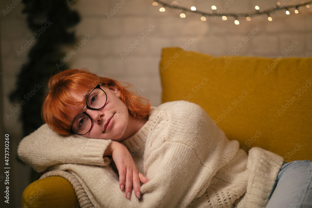 Young Woman Resting On A Couch Young Woman Resting On A Couch