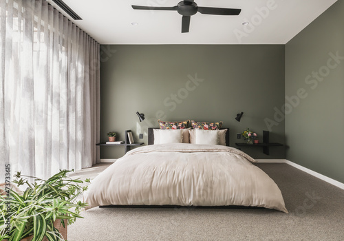 Modern green master bedroom photo
