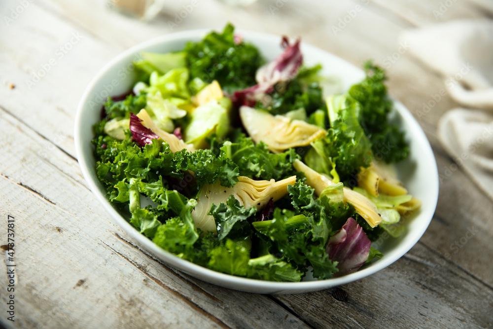 Fresh green salad with artichoke Fresh green salad with artichoke