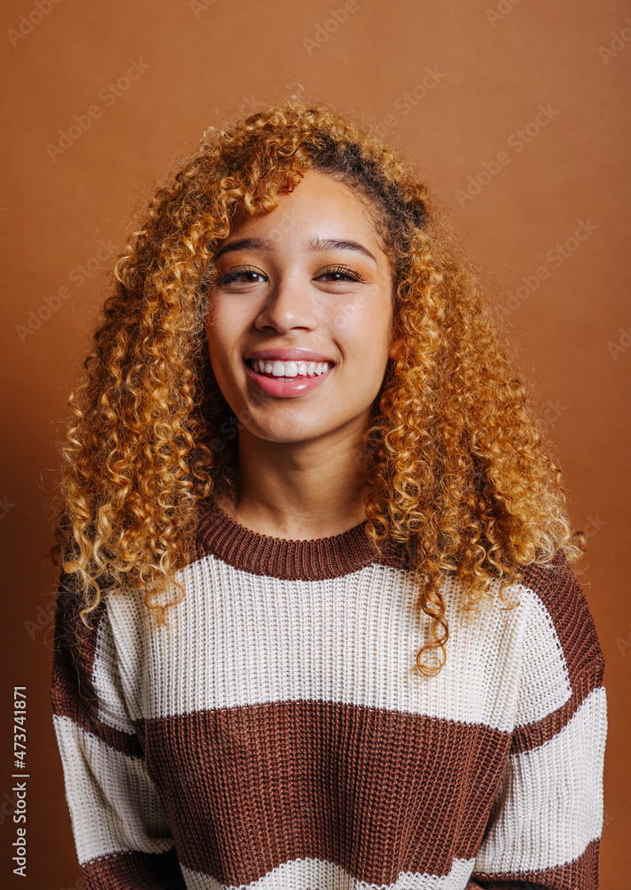 Portrait of charming happy woman in warm sweater Portrait of charming happy woman in warm sweater