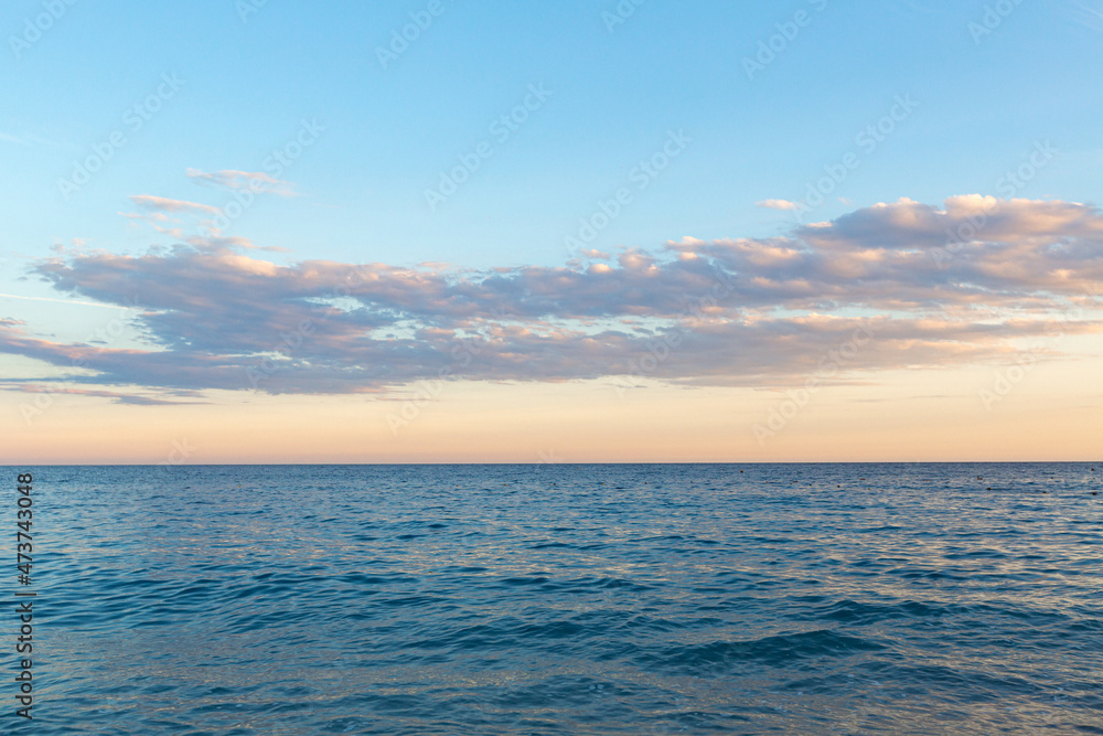 blue sea with sunset view