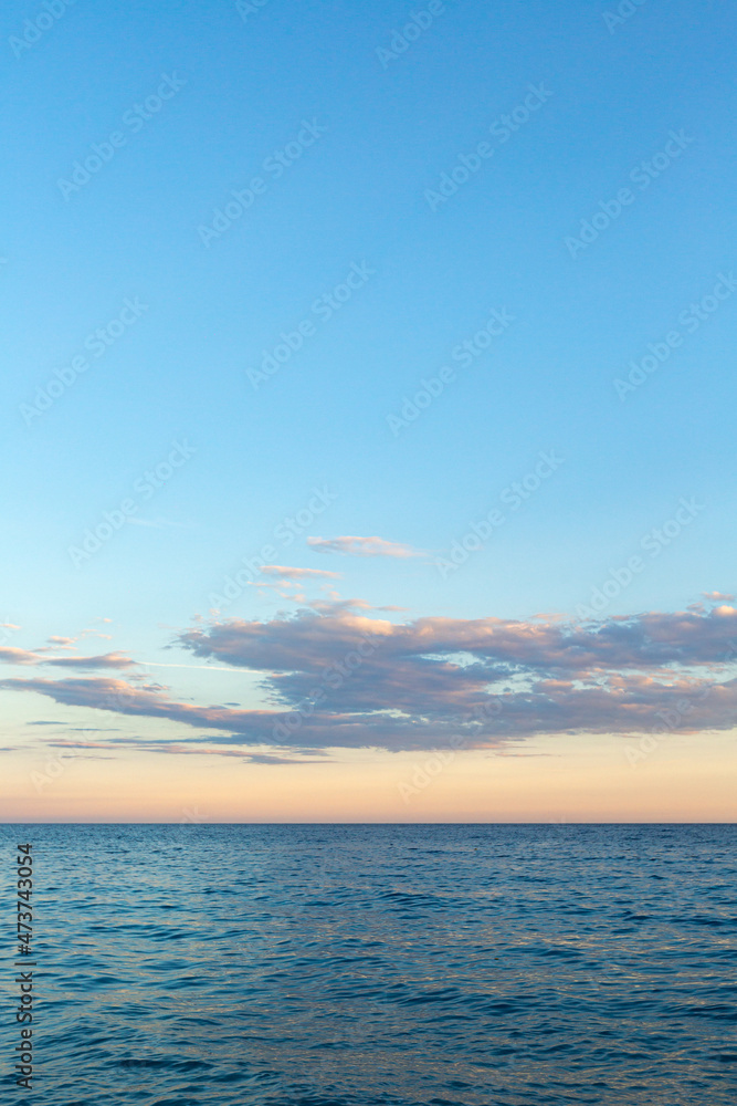 blue sea with sunset view