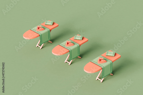 three ironing boards in a row on a green background.  photo