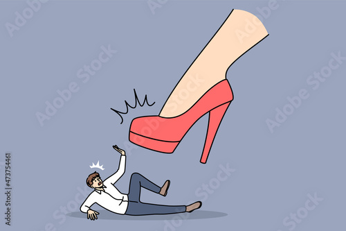 Strength of woman manipulating concept. Female foot in red shoes with high heels reaching for and trying to push tine young afraid man asking to stop vector illustration 