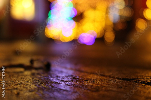 Картината върху платно Artistic, warm, christmassy background showing blurred out colourful lights for