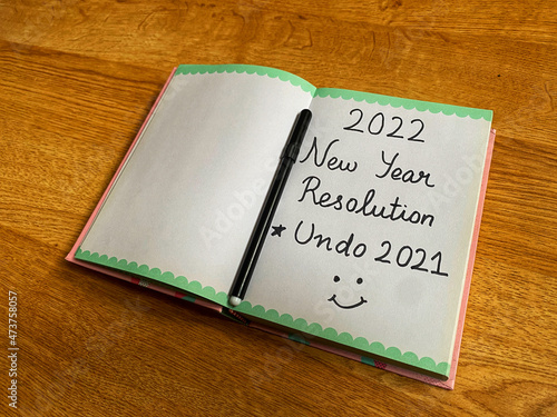 2022 New Year Resolution is to undo the year 2021 - Text in a diary