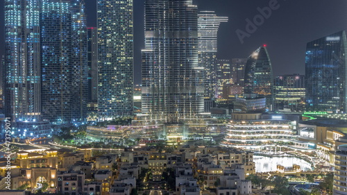 Dubai Downtown all night timelapse with tallest skyscraper and other towers photo