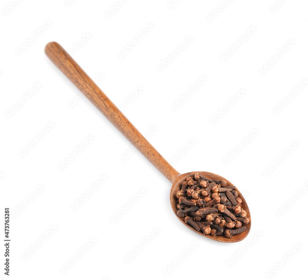 Wooden spoon with aromatic dry cloves isolated on white, top view Wooden spoon with aromatic dry cloves isolated on white, top view