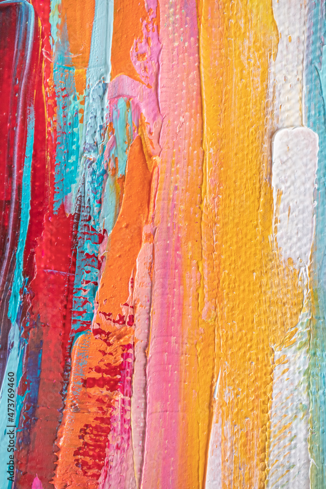 The background is written in acrylic. Painting in multicolored tones. Closeup of a painting by oil and palette knife on canvas.
