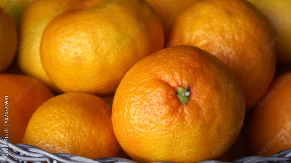 many tangerines close-up with a moving camera many tangerines close-up with a moving camera