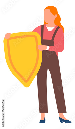 Woman holding golden shield. Girl with security symbol