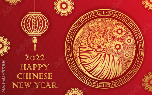 Chinese new year 2022, year of the tiger banner with gold tiger zodiac and gold flower and asian elements paper cut with craft style.
