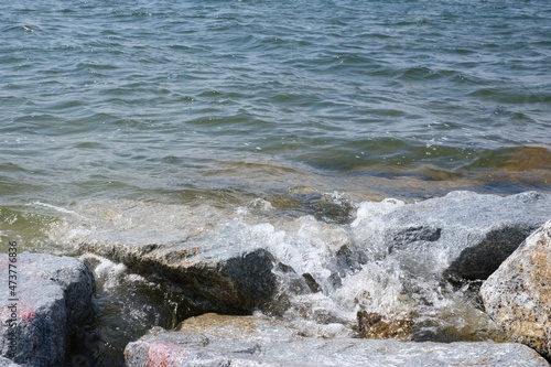 Rocks by the sea with waves crashing