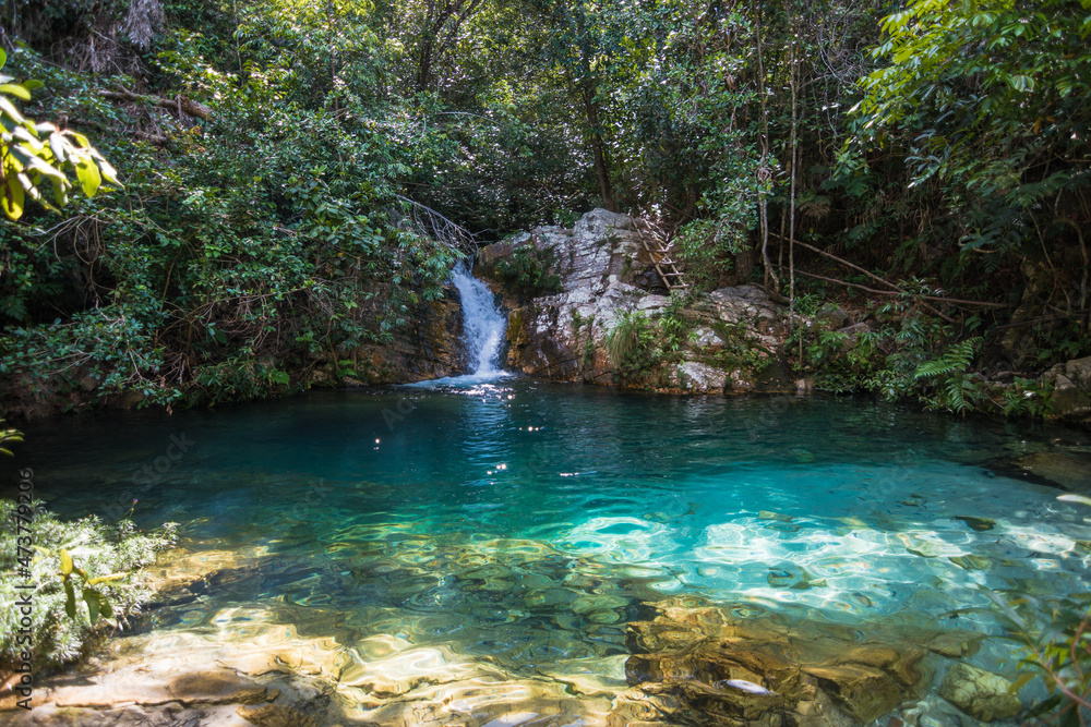 View of the beautiful Cachoeira de Santa Barbara (Saint Barbara Waterfall) at Chapada dos Veadeiros - Cavalcante, Goiás, Brazil View of the beautiful Cachoeira de Santa Barbara (Saint Barbara Waterfall) at Chapada dos Veadeiros - Cavalcante, Goiás, Brazil