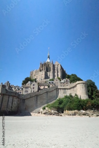 Mont saint michel architecture panoramic beautiful postcard view at Dusk in Summer Low Tide, France