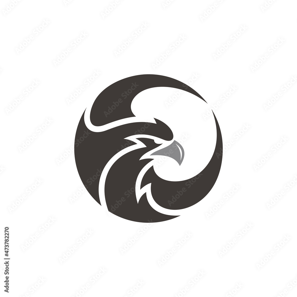 Phoenix or eagle, falcon, hawk head and wing in a circle shape vector icon logo template Phoenix or eagle, falcon, hawk head and wing in a circle shape vector icon logo template