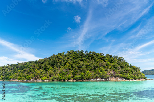 Beautiful Andaman sea, Tropical Turquoise clear blue sea and blue sky background at Lipe Island, Satun, Thailand -  summer  vacation travel © lukyeee_nuttawut