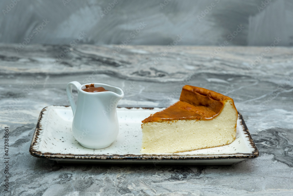 Obraz premium San Sebastian Cheesecake on marble floor