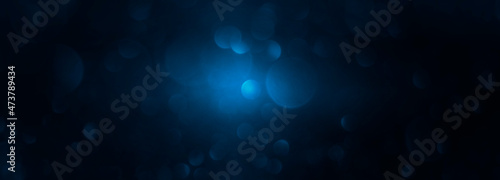 Background of glitter lights, defocused Abstract blue, and black. bokeh background, Decoration element for Christmas and New Year holidays, greeting cards, web banners, posters