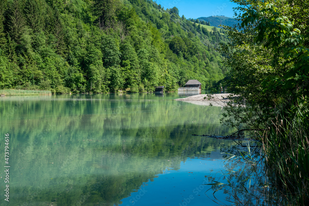 Fototapeta premium Walking around the Klammsee near Kaprun in Salzbur, Austria. The Klammsee is one of the reservoirs for the power plant in Kaprun.
