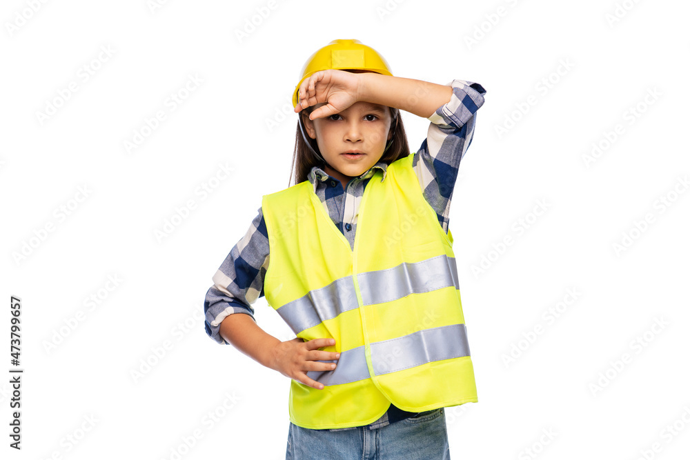 building, construction and profession concept - tired little girl in protective helmet and safety vest over white background