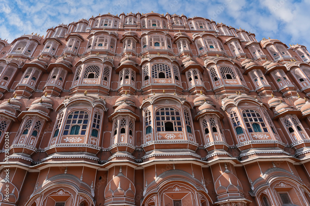 Hawa Mahal, pink palace of winds in old city Jaipur, Rajasthan, India. Background of indian architecture