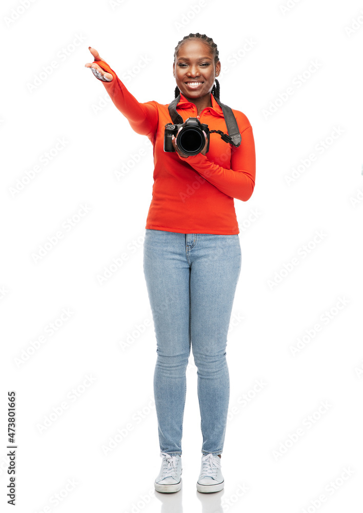 people, profession and photography concept - happy young woman with digital camera over white background people, profession and photography concept - happy young woman with digital camera over white background