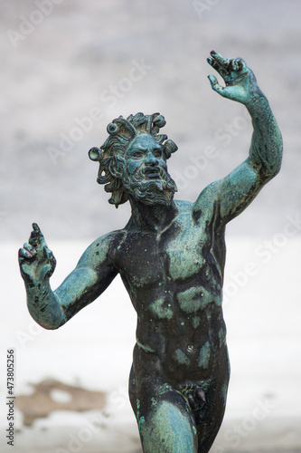 statue of a dancing faun in the house of Faun, Pompei