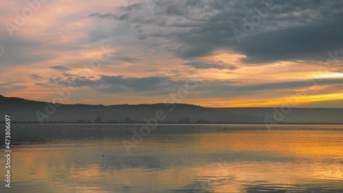 Wallpaper Mural Stunning sunrise at the lake with reflections and colored clouds during autumn Torontodigital.ca