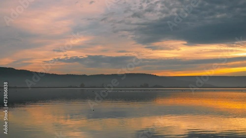 Wallpaper Mural Stunning sunrise at the lake with reflections and colored clouds during autumn Torontodigital.ca