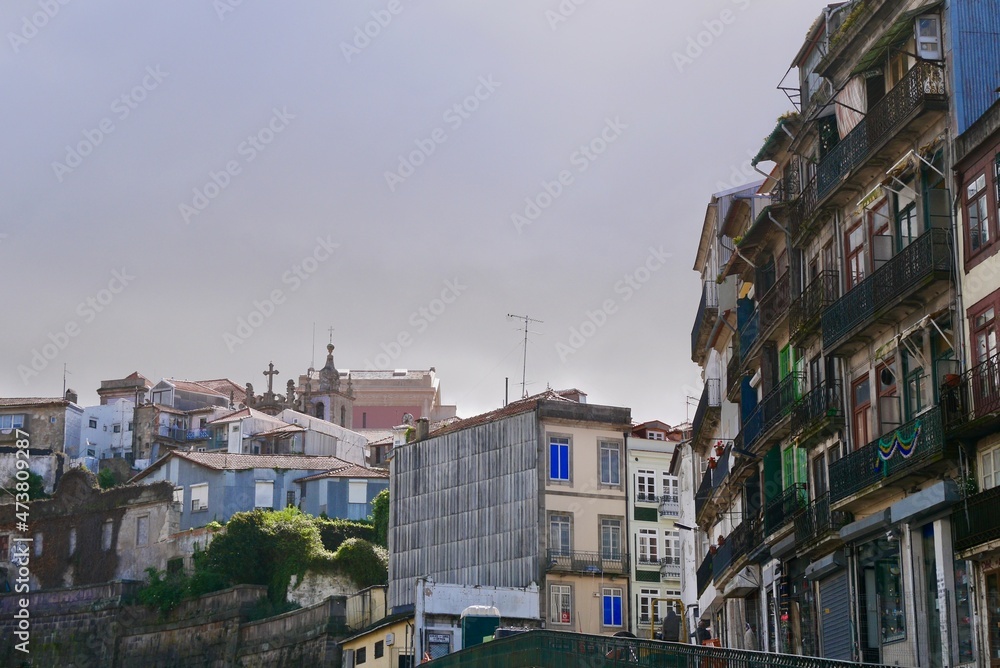 Panoramic view of Porto skyline, old town with traditional colorful houses and churches. Portugal.