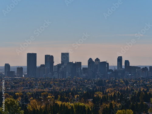 Beautiful cityscape of Calgary  Alberta  Canada in autumn season viewed from Nose Hill Park with colorful meadow  residential areas and skyline.
