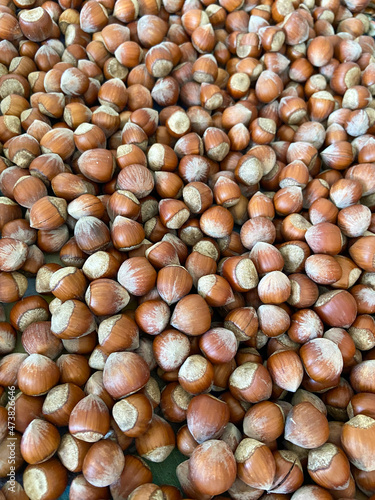 Hazelnuts, background with full of nuts.