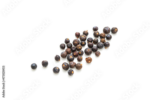 A pile of dry juniper berries photo