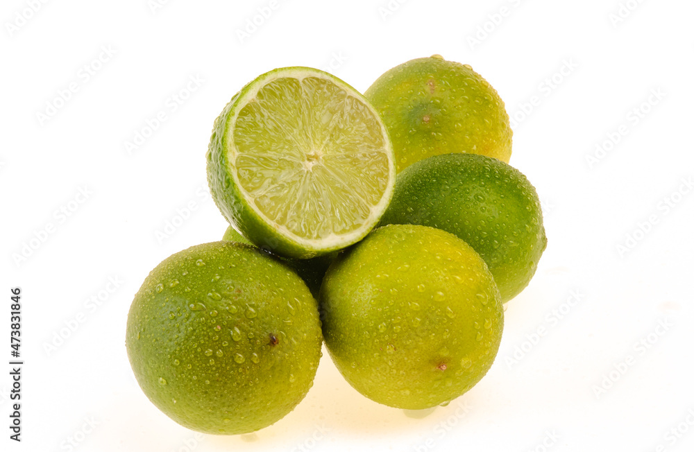 Lemons being one cut in half on white background. Lemons being one cut in half on white background.