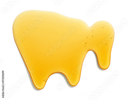 Cuadro en lienzo flowing honey on white background
