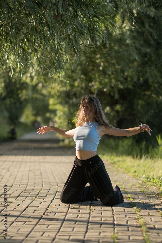 Girl dancing  in the park