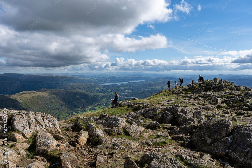 Fototapeta premium People on summit of Lake District mountain 
