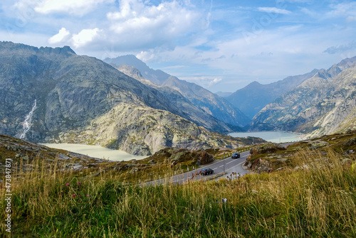 Traffic on the Grimsel Pass. The Grimsel Pass connects the Swiss cantons of Bern and wallis and is a watershed between the North Sea and the Mediterranean Sea
